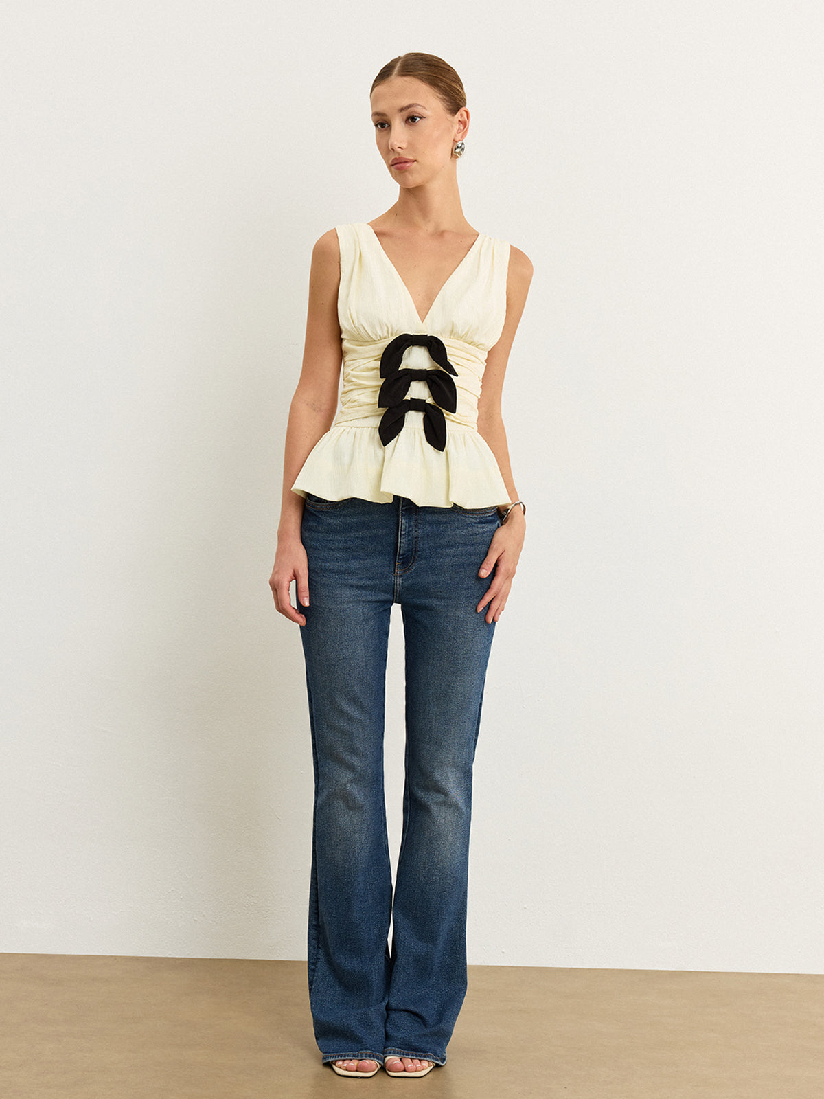 Peplum Etek Ucuyla Fiyonk Detaylı Büzgülü Üst
